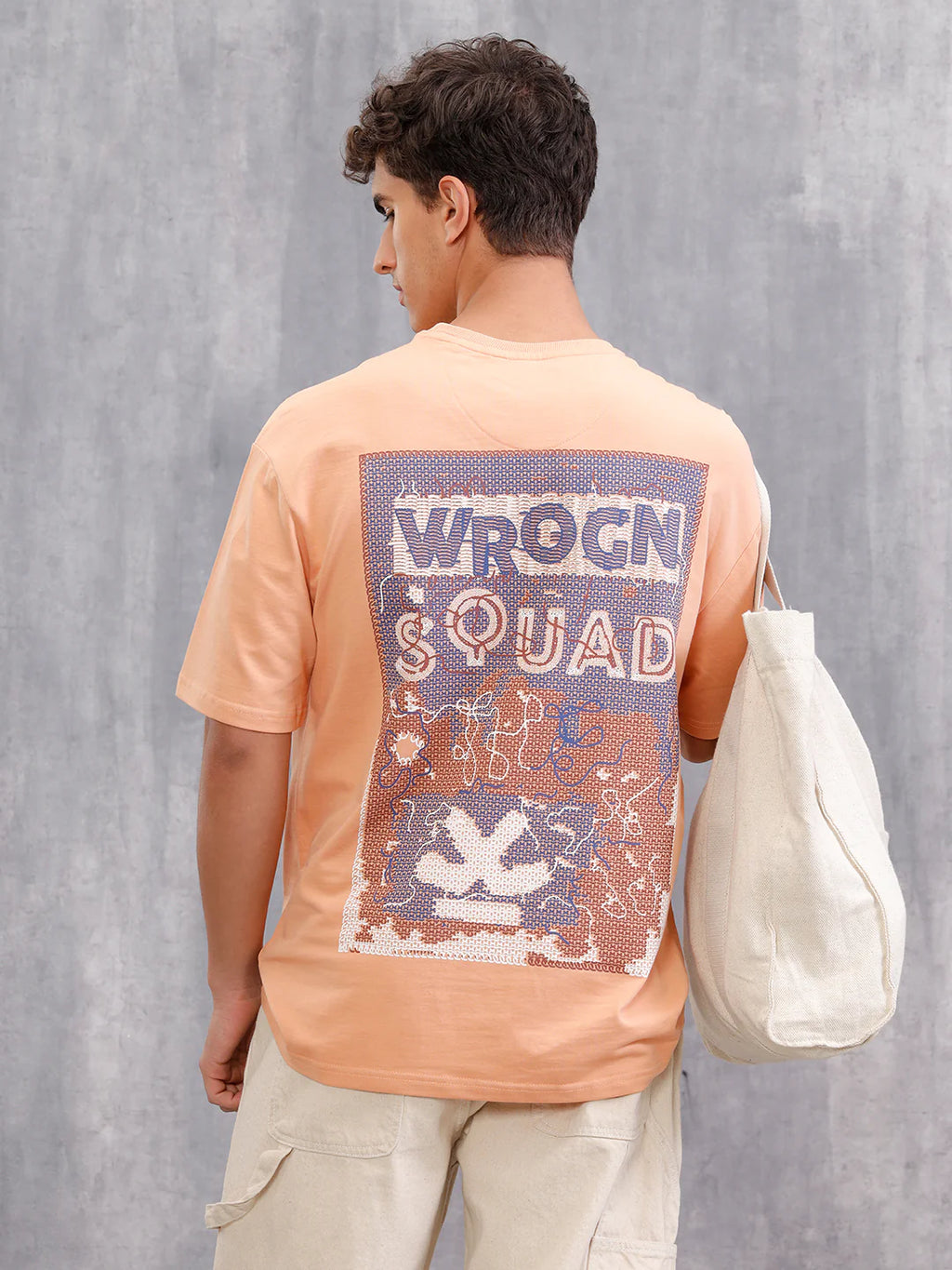 Frayed Yarn Look Wrogn Squad Oversized Back Print Crew Neck T-Shirt | Peach