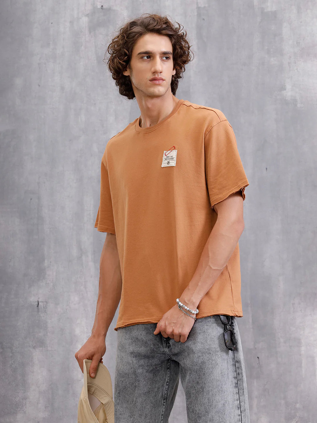 Solid Oversized T-Shirt With Printed Canvas Patch And Raw Edge Detail | Brown