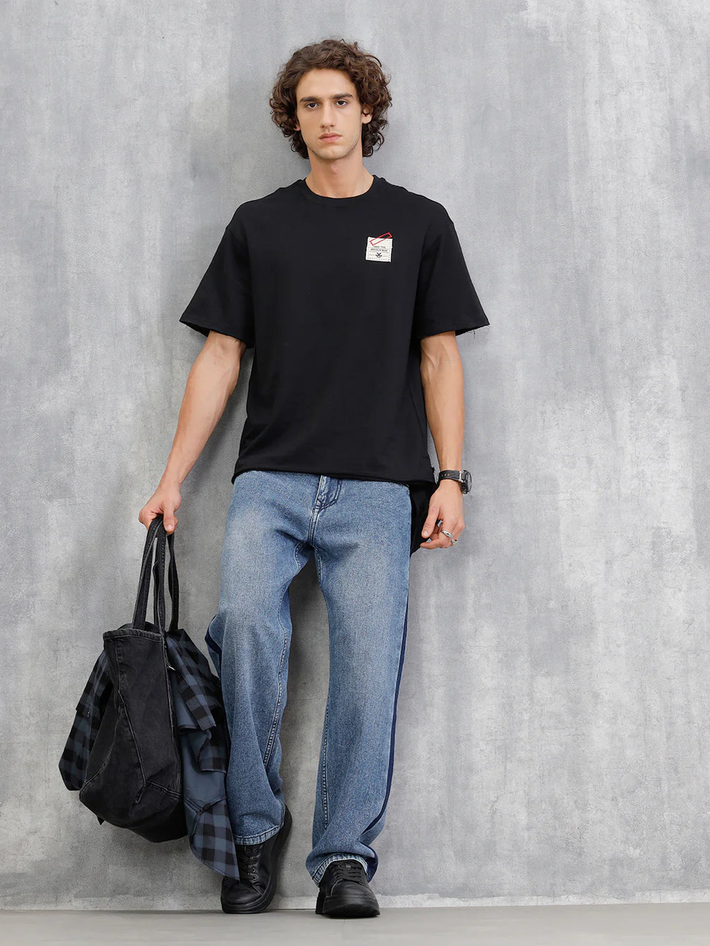 Solid Oversized T-Shirt With Printed Canvas Patch And Raw Edge Detail | Black