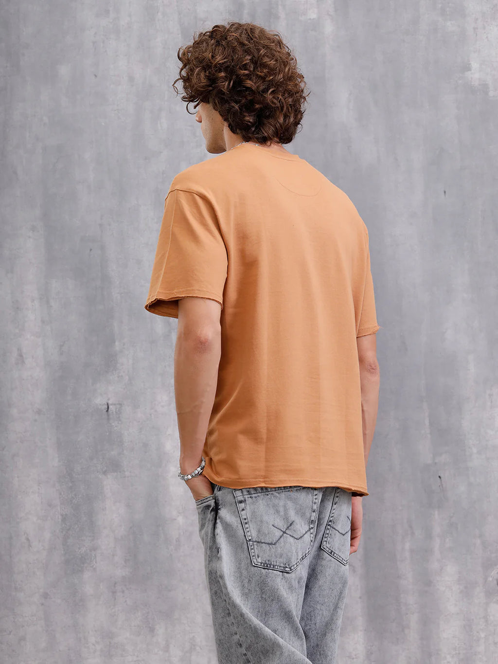 Solid Oversized T-Shirt With Printed Canvas Patch And Raw Edge Detail | Brown