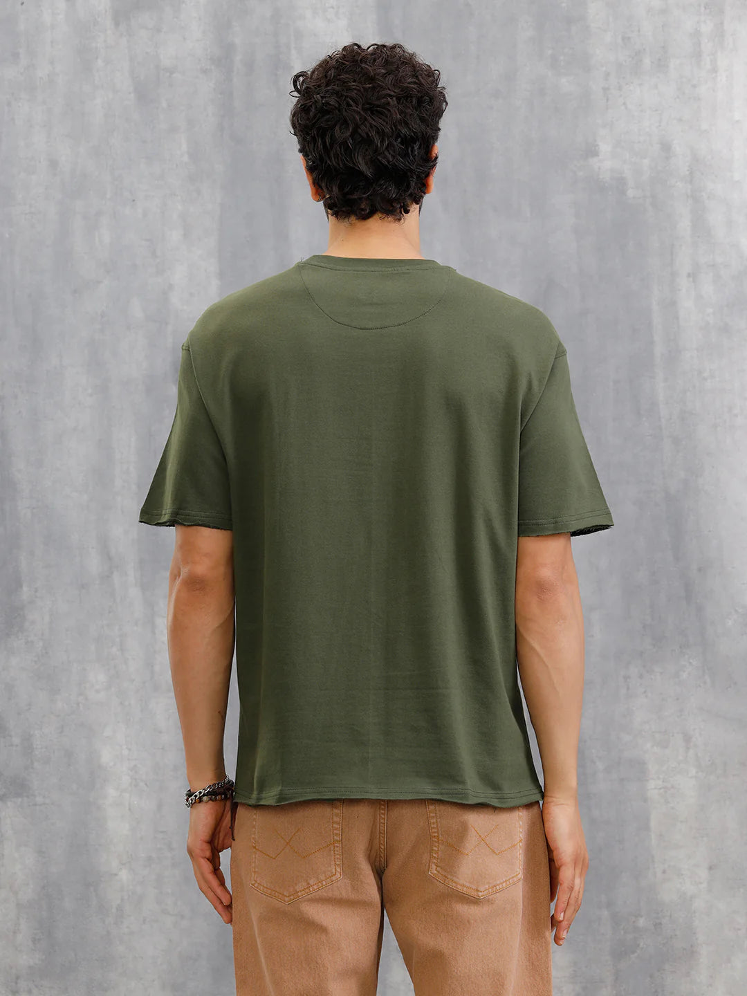 Solid Oversized T-Shirt With Printed Canvas Patch And Raw Edge Detail | Olive