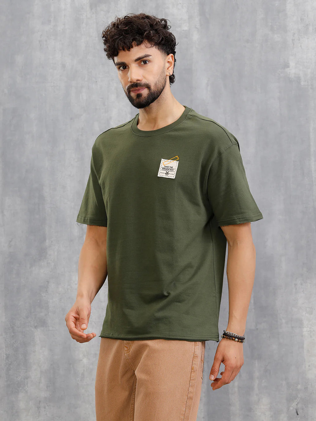 Solid Oversized T-Shirt With Printed Canvas Patch And Raw Edge Detail | Olive
