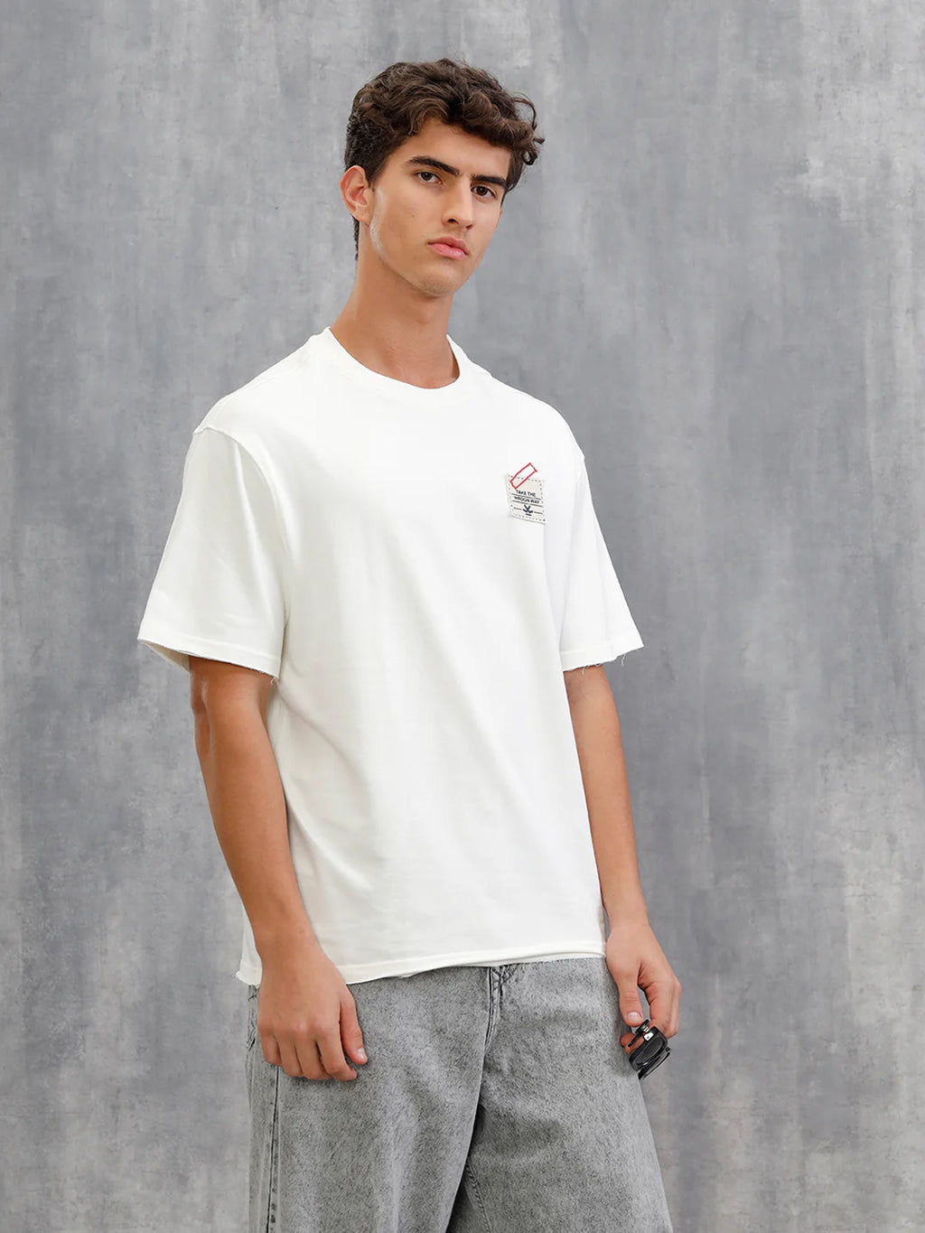 Solid Oversized T-Shirt With Printed Canvas Patch And Raw Edge Detail  | Off White