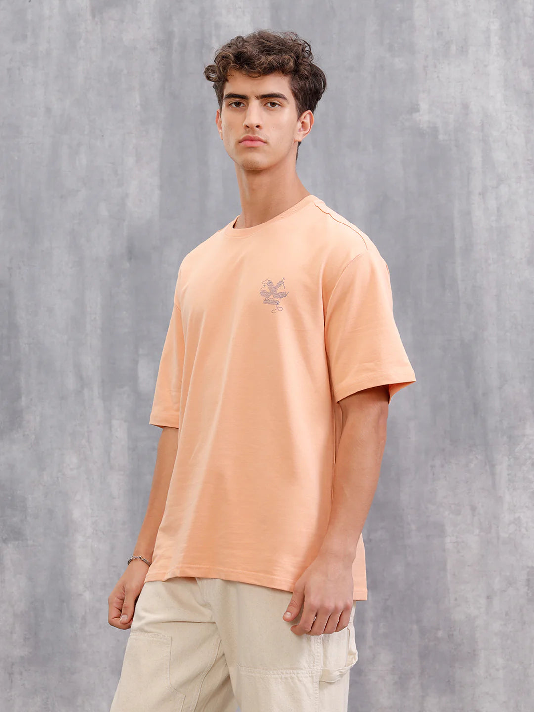 Frayed Yarn Look Wrogn Squad Oversized Back Print Crew Neck T-Shirt | Peach