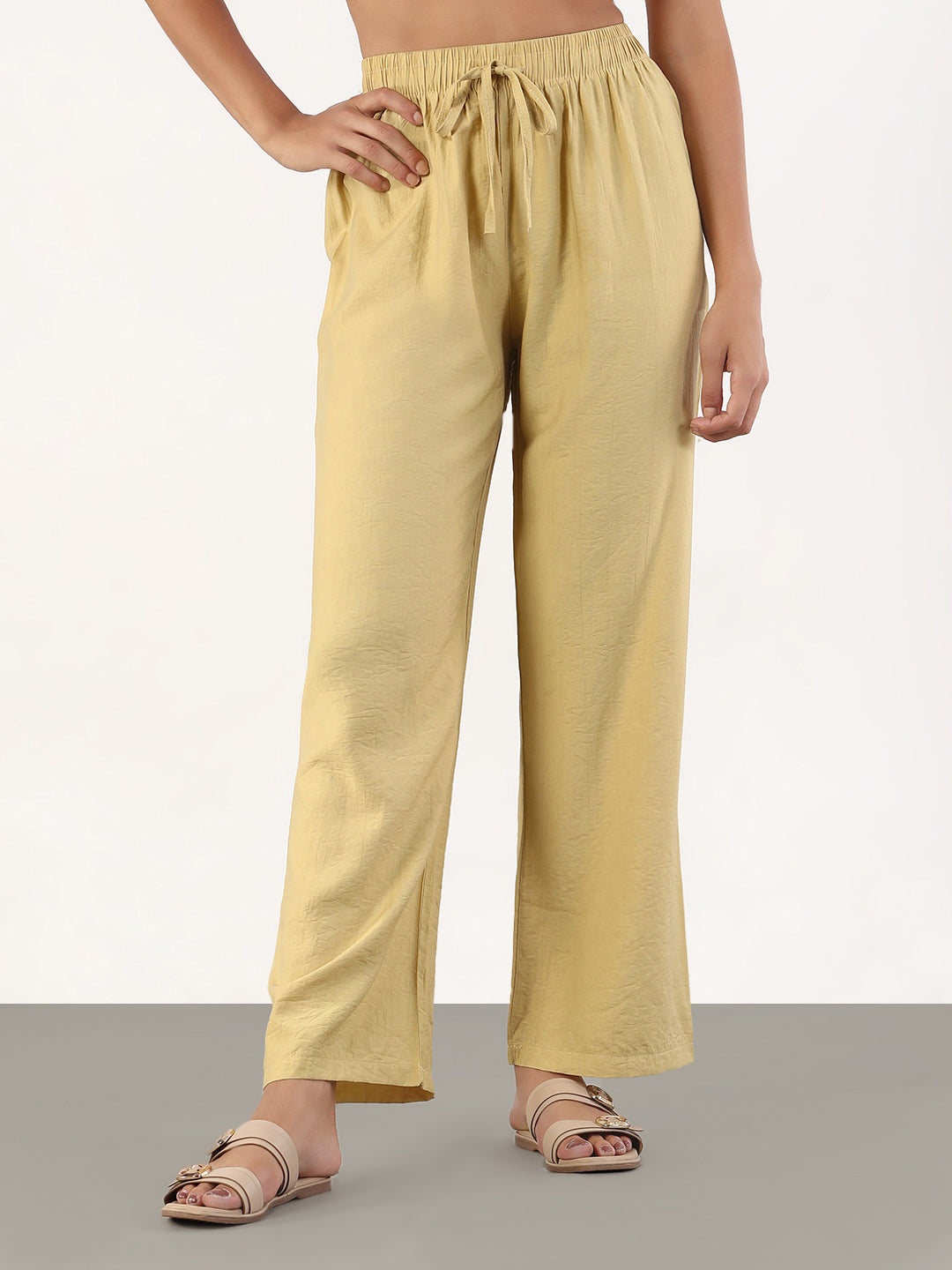 Women's Beige Loose Fit Solid Parallel Trousers