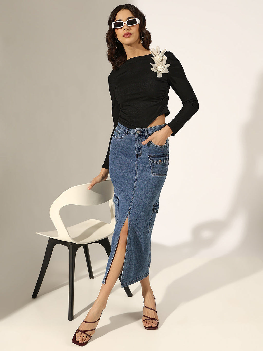 Women's Ribbed Black Ruched Top with Flower Applique Detail