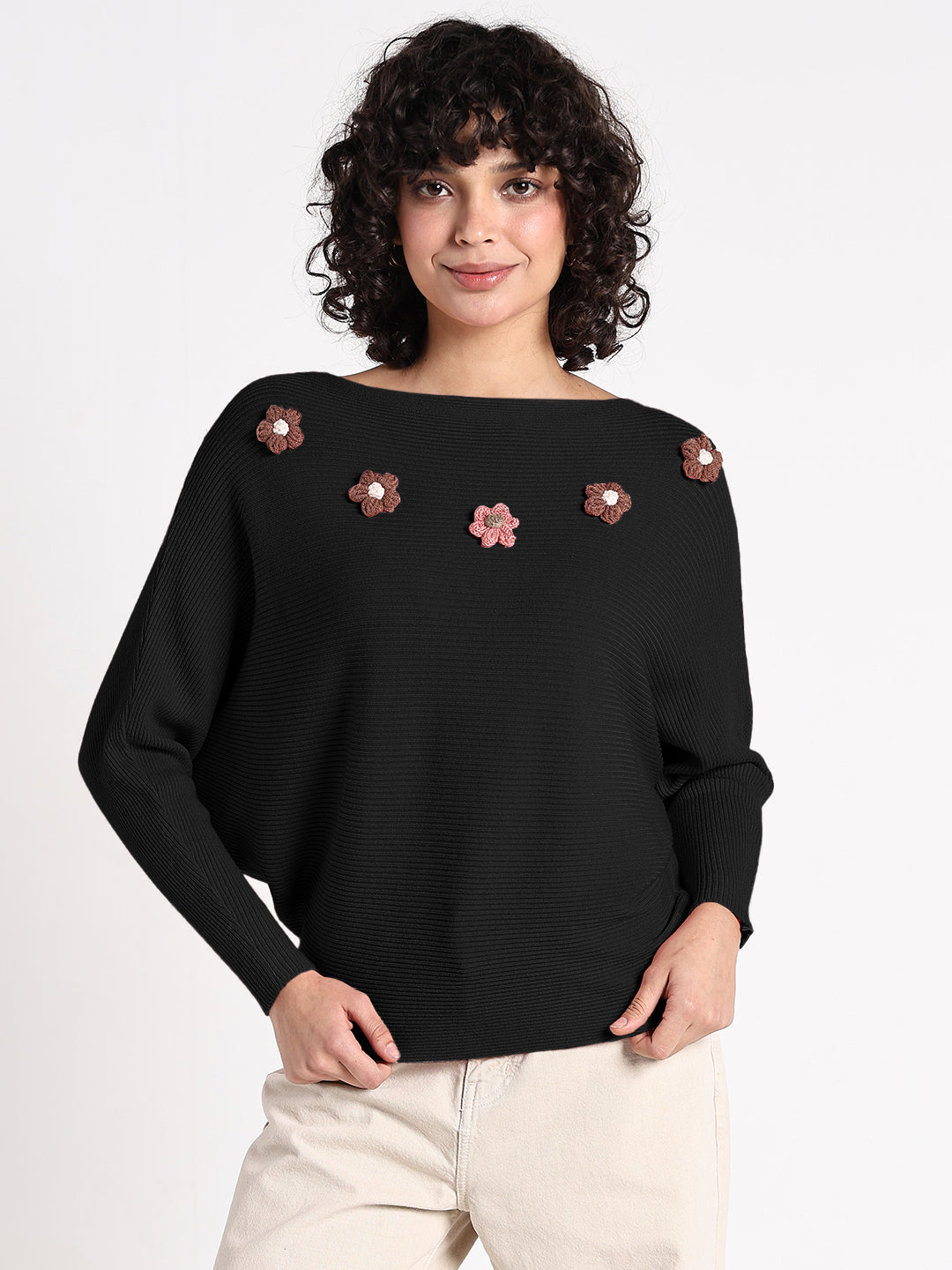 Women's Black Textured Knit Top with Flower Applique Detail