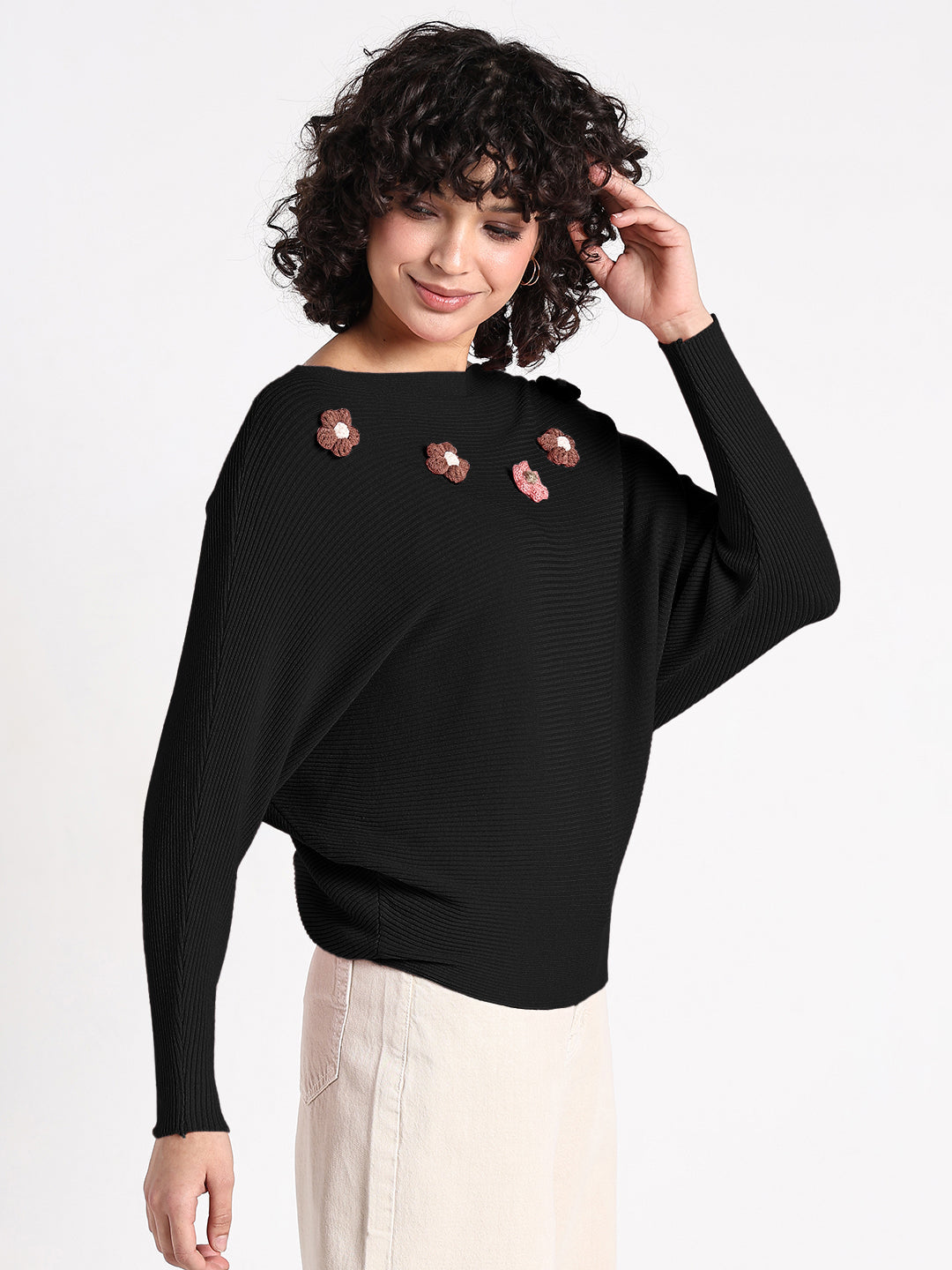Women's Black Textured Knit Top with Flower Applique Detail