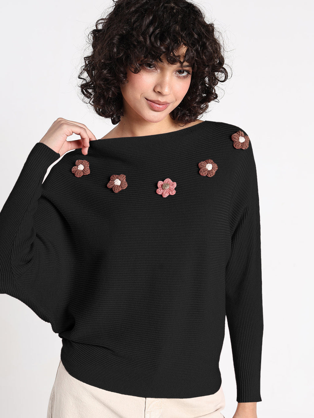 Women's Black Textured Knit Top with Flower Applique Detail