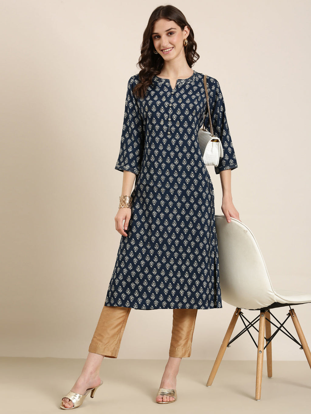 Women's Teal Ethnic Motifs Printed Straight Kurta