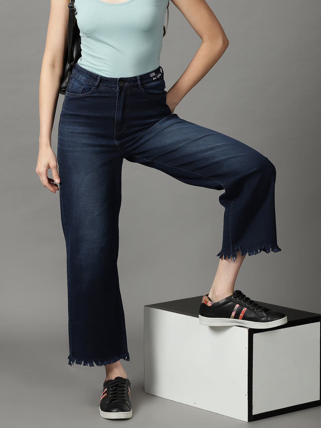 Women's Navy Blue Straight Fit High-Rise Light Fade Stretchable Jeans