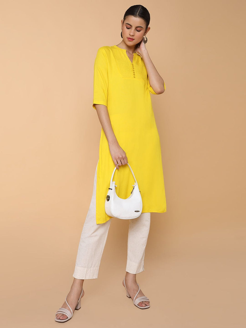 Women's Straight Yellow Solid Kurta