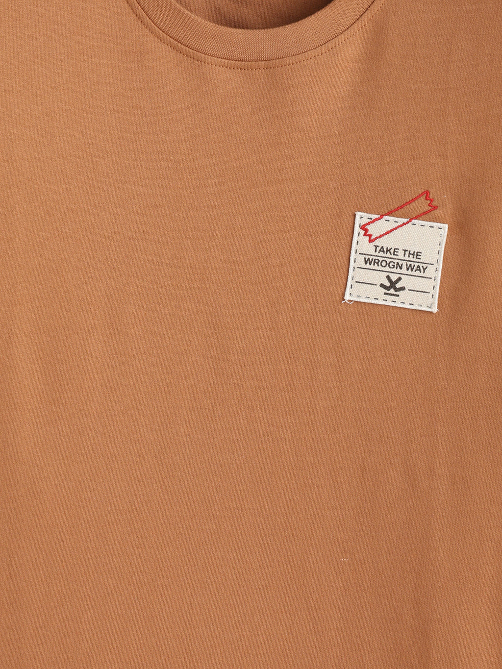 Solid Oversized T-Shirt With Printed Canvas Patch And Raw Edge Detail | Brown