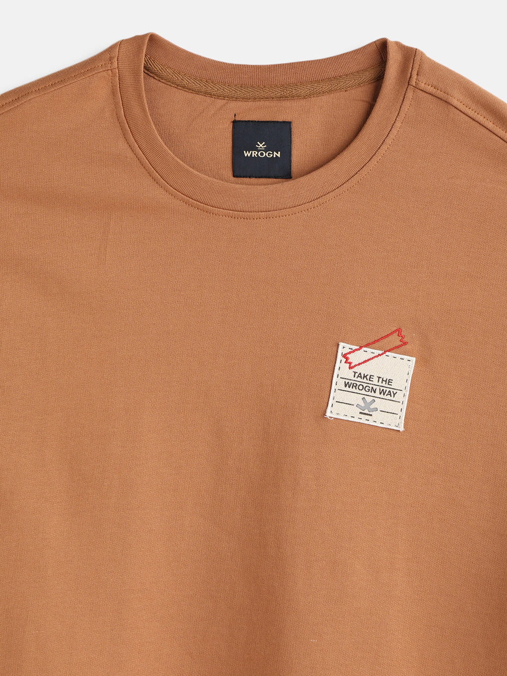 Solid Oversized T-Shirt With Printed Canvas Patch And Raw Edge Detail | Brown
