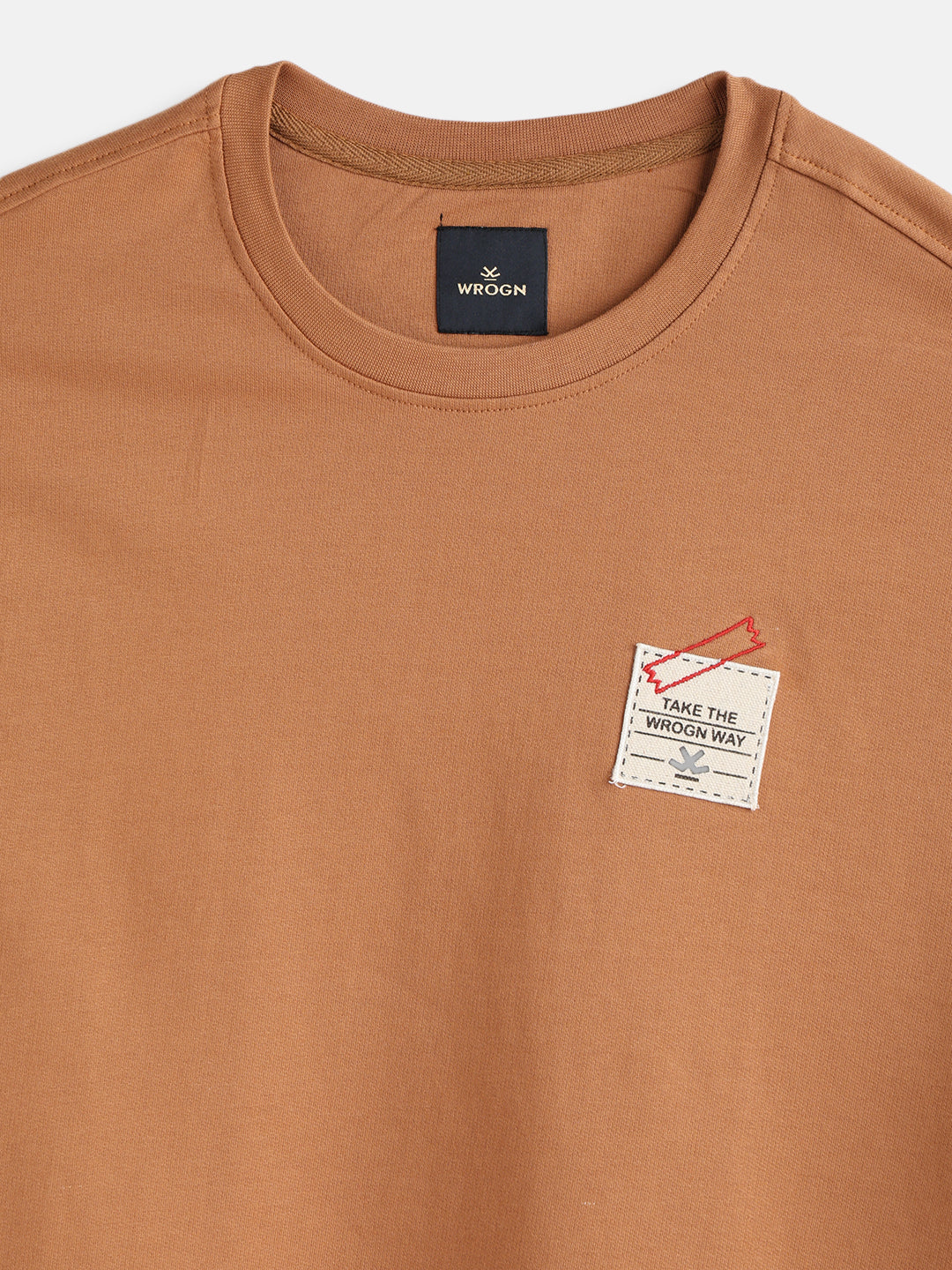 Solid Oversized T-Shirt With Printed Canvas Patch And Raw Edge Detail | Brown