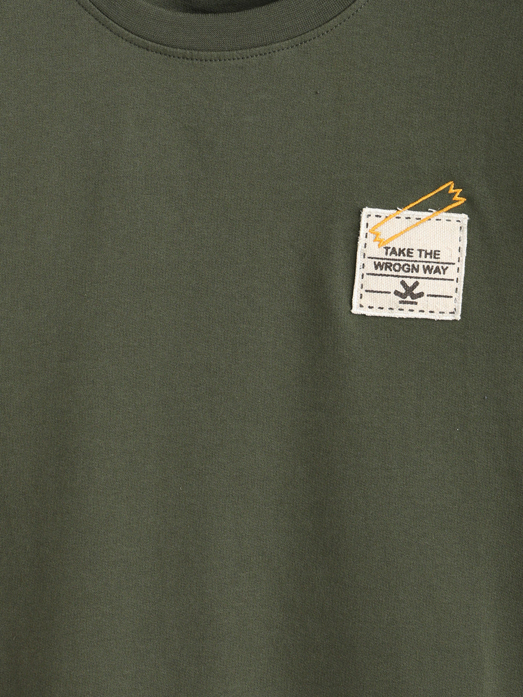 Solid Oversized T-Shirt With Printed Canvas Patch And Raw Edge Detail | Olive