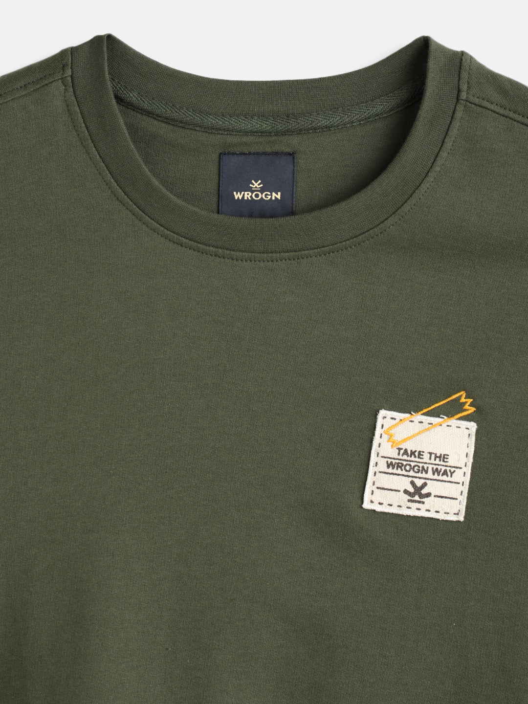 Solid Oversized T-Shirt With Printed Canvas Patch And Raw Edge Detail | Olive